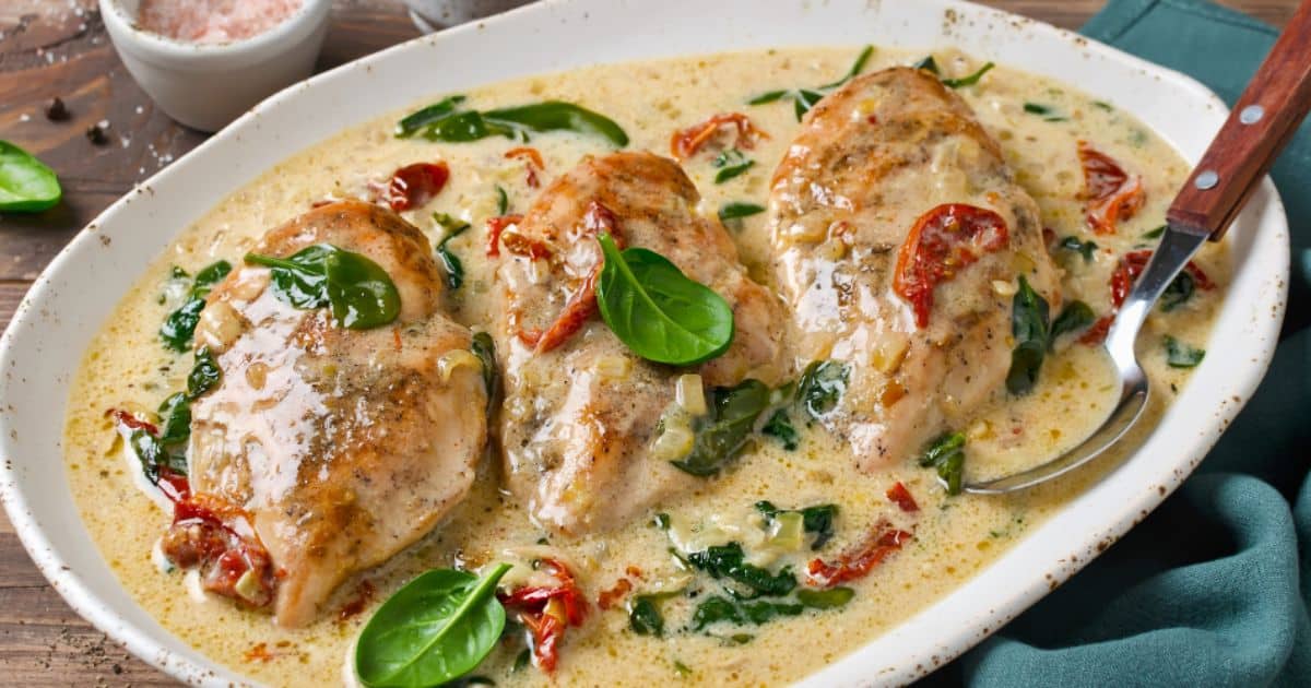 plate with sun dried tomato cream sauce and chicken